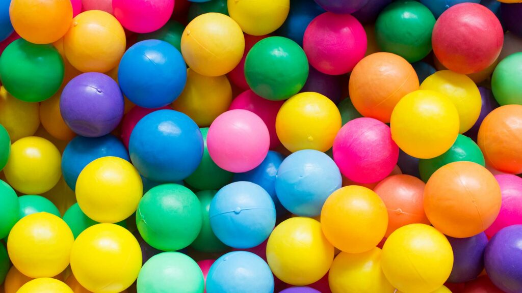 Colorful plastic balls with many different colors